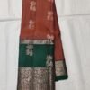 Semi Kanchi Pattu Handloom Saree Rust colour Body with Emerald Green Peacock Zari Border
