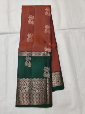 Semi Kanchi Pattu Handloom Saree Rust colour Body with Emerald Green Peacock Zari Border