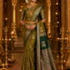 Semi Kanchi Pattu Handloom Saree in Olive Gold with Emerald Green Peacock Zari Border Semi Kanchi Pattu Handloom Saree Olive Gold & Emerald Green with Peacock Zari Border | Traditional Silk Saree