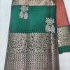 Rust colour Skut border butta design with green pallu
