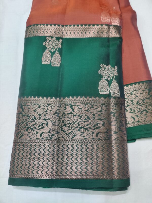 Rust colour Skut border butta design with green pallu