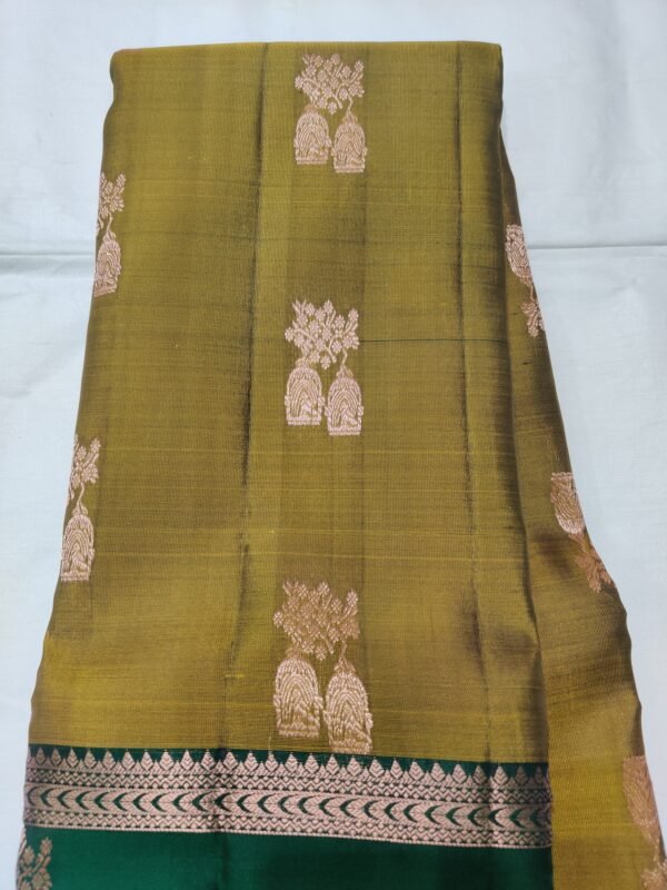 Semi Kanchi Pattu Handloom Saree in Olive Gold with Emerald Green Peacock Zari Border Semi Kanchi Pattu Handloom Saree Olive Gold & Emerald Green with Peacock Zari Border | Traditional Silk Saree